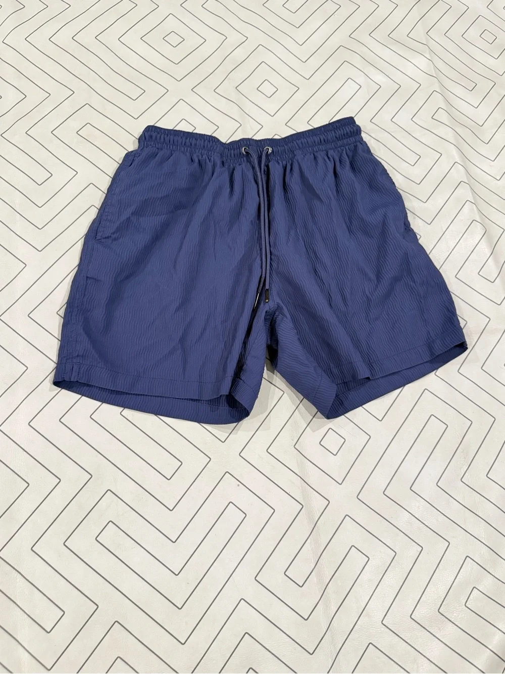 Chubbies Blue Textured Swim Trunks
